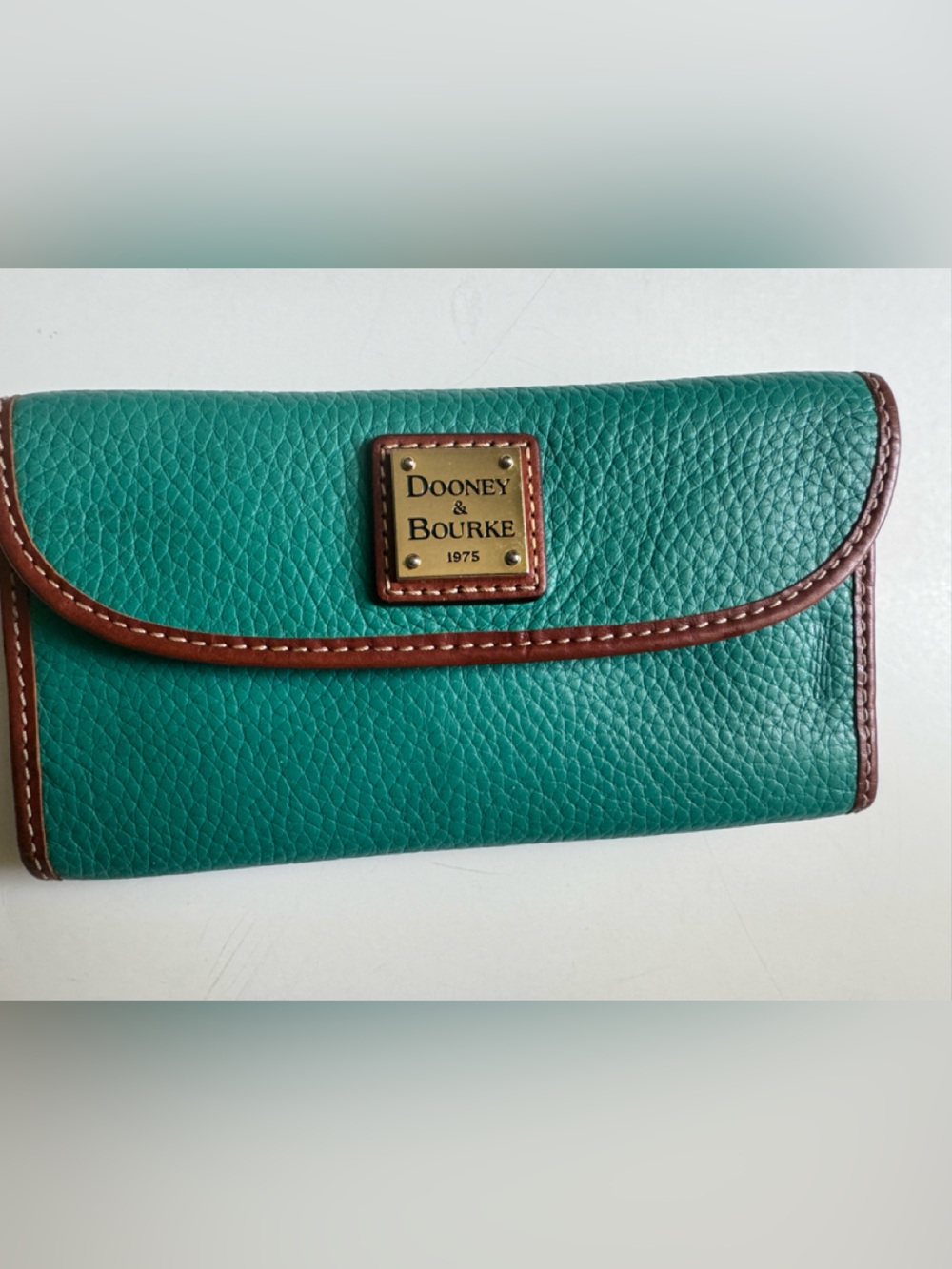 Dooney & Bourke Teal Pebble Leather Continental Wallet with Brown Leather Trim